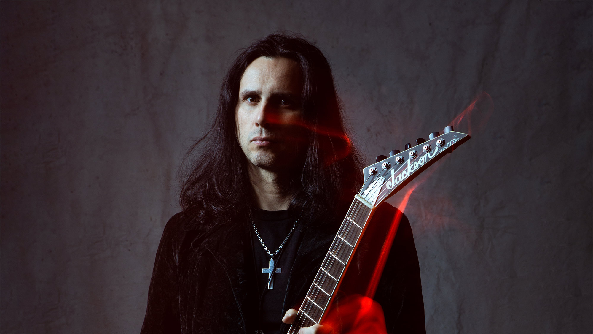 FIVE QUESTIONS TO... GUS G.