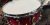 Close-up of a red snare drum from the Hardcore Kit in the recording studio.